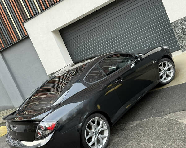 Черный Хендай Купе, объемом двигателя 2.66 л и пробегом 110 тыс. км за 4499 $, фото 10 на Automoto.ua