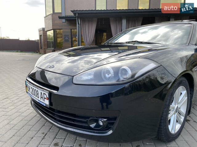 Черный Хендай Купе, объемом двигателя 2 л и пробегом 130 тыс. км за 7000 $, фото 3 на Automoto.ua