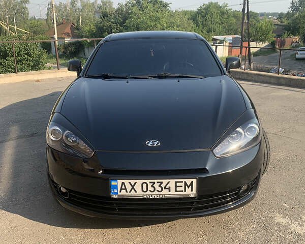 Чорний Хендай Купе, об'ємом двигуна 1.98 л та пробігом 83 тис. км за 8800 $, фото 2 на Automoto.ua