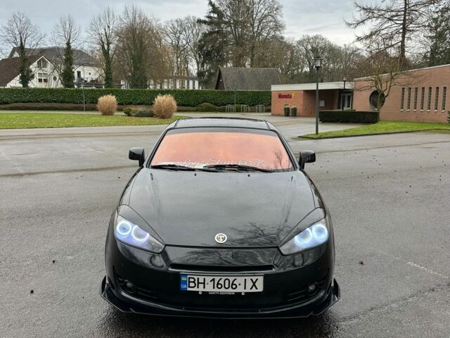 Чорний Хендай Купе, об'ємом двигуна 2 л та пробігом 198 тис. км за 8152 $, фото 1 на Automoto.ua