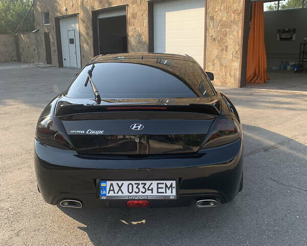 Чорний Хендай Купе, об'ємом двигуна 1.98 л та пробігом 83 тис. км за 8800 $, фото 4 на Automoto.ua