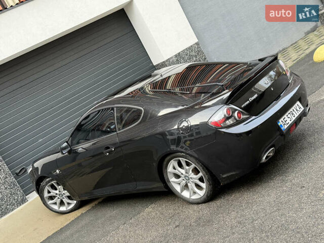 Черный Хендай Купе, объемом двигателя 2.66 л и пробегом 110 тыс. км за 4499 $, фото 7 на Automoto.ua