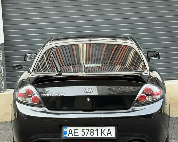 Черный Хендай Купе, объемом двигателя 2.66 л и пробегом 110 тыс. км за 4499 $, фото 11 на Automoto.ua
