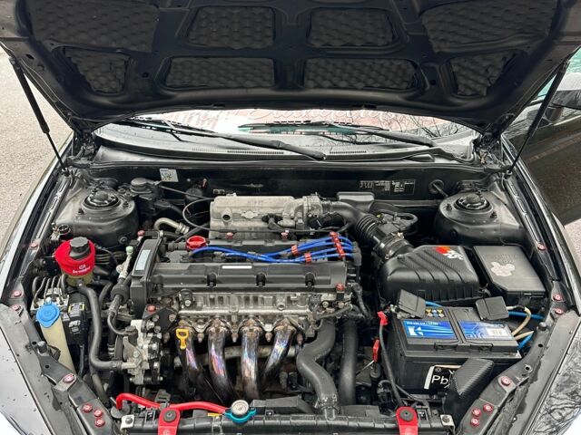 Чорний Хендай Купе, об'ємом двигуна 2 л та пробігом 198 тис. км за 8152 $, фото 11 на Automoto.ua