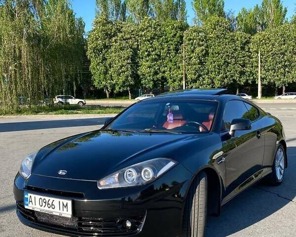 Чорний Хендай Купе, об'ємом двигуна 2 л та пробігом 186 тис. км за 6500 $, фото 6 на Automoto.ua