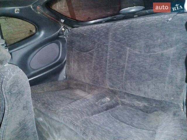 Червоний Хендай Купе, об'ємом двигуна 2 л та пробігом 266 тис. км за 2600 $, фото 18 на Automoto.ua