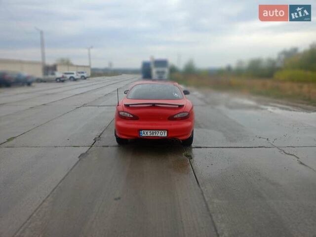 Червоний Хендай Купе, об'ємом двигуна 2 л та пробігом 290 тис. км за 3500 $, фото 1 на Automoto.ua