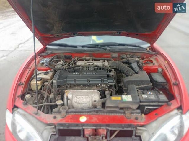 Червоний Хендай Купе, об'ємом двигуна 2 л та пробігом 290 тис. км за 3500 $, фото 7 на Automoto.ua