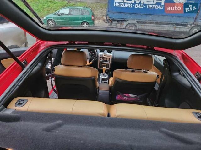 Красный Хендай Купе, объемом двигателя 2.7 л и пробегом 200 тыс. км за 5800 $, фото 10 на Automoto.ua