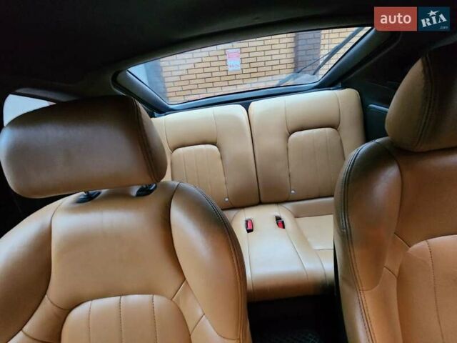 Красный Хендай Купе, объемом двигателя 2.7 л и пробегом 200 тыс. км за 5800 $, фото 8 на Automoto.ua