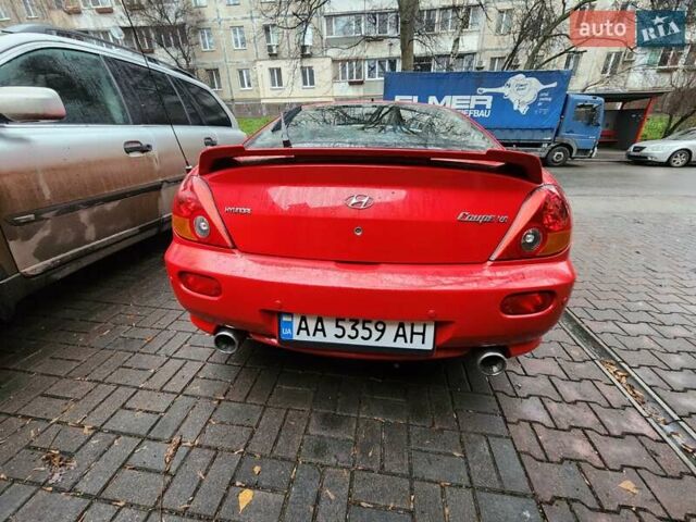 Красный Хендай Купе, объемом двигателя 2.7 л и пробегом 200 тыс. км за 5800 $, фото 3 на Automoto.ua