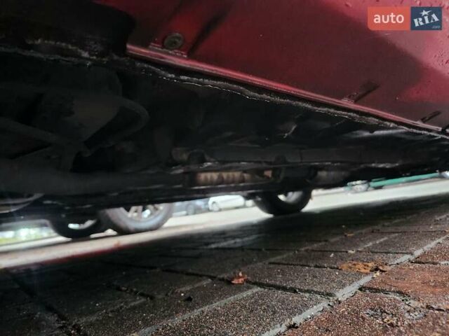 Красный Хендай Купе, объемом двигателя 2.7 л и пробегом 200 тыс. км за 5800 $, фото 14 на Automoto.ua
