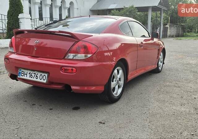 Червоний Хендай Купе, об'ємом двигуна 1.98 л та пробігом 230 тис. км за 5799 $, фото 4 на Automoto.ua