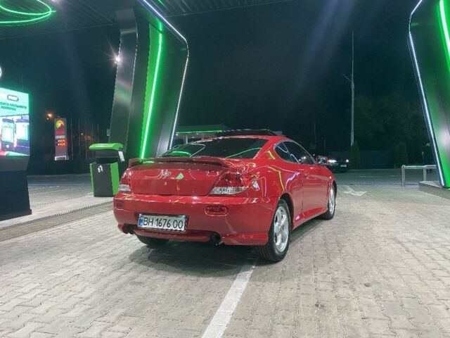 Красный Хендай Купе, объемом двигателя 2 л и пробегом 230 тыс. км за 5280 $, фото 2 на Automoto.ua