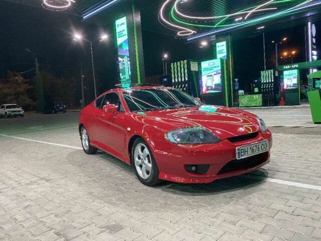 Красный Хендай Купе, объемом двигателя 2 л и пробегом 230 тыс. км за 5280 $, фото 1 на Automoto.ua