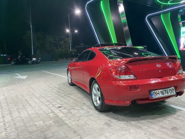 Красный Хендай Купе, объемом двигателя 2 л и пробегом 230 тыс. км за 5280 $, фото 5 на Automoto.ua