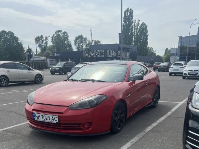 Красный Хендай Купе, объемом двигателя 2.7 л и пробегом 230 тыс. км за 5999 $, фото 1 на Automoto.ua