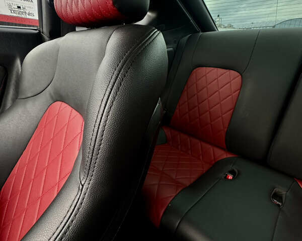 Красный Хендай Купе, объемом двигателя 1.98 л и пробегом 180 тыс. км за 10000 $, фото 2 на Automoto.ua