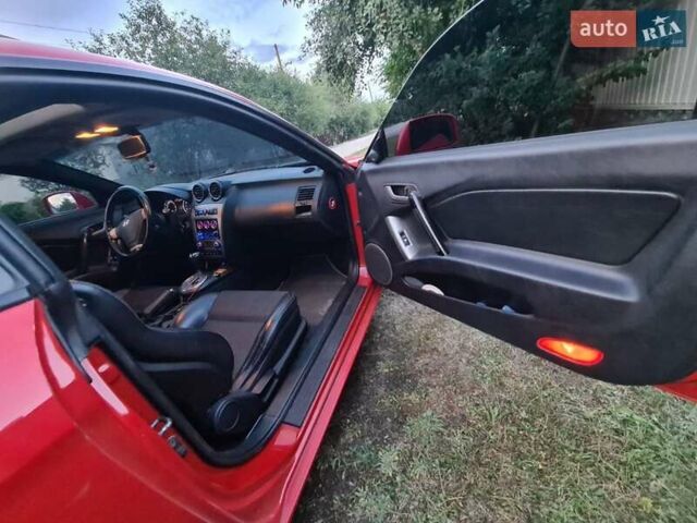 Червоний Хендай Купе, об'ємом двигуна 2 л та пробігом 250 тис. км за 6500 $, фото 5 на Automoto.ua