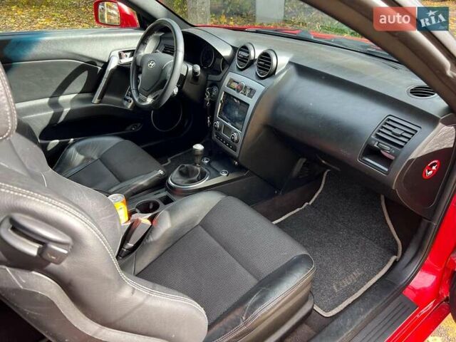 Червоний Хендай Купе, об'ємом двигуна 2 л та пробігом 209 тис. км за 6490 $, фото 14 на Automoto.ua