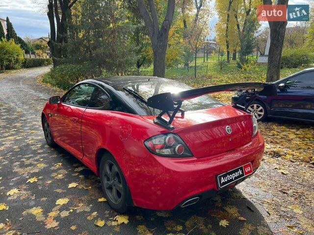 Червоний Хендай Купе, об'ємом двигуна 2 л та пробігом 209 тис. км за 6490 $, фото 6 на Automoto.ua