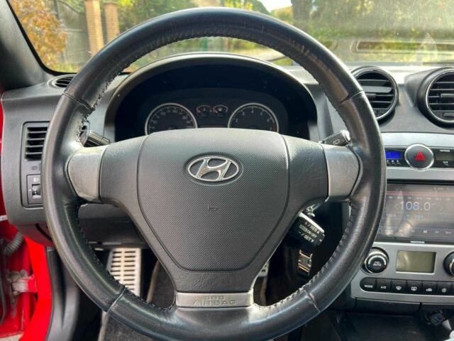 Хендай Купе 2008 в Киеве на Automoto.ua Красный Хендай Купе, объемом двигателя 2 л и пробегом 209 тыс. км за 6490 $, фото 10 на Automoto.ua