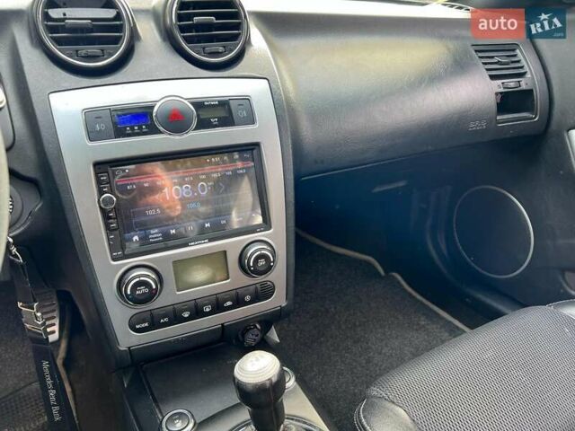 Червоний Хендай Купе, об'ємом двигуна 2 л та пробігом 209 тис. км за 6490 $, фото 11 на Automoto.ua