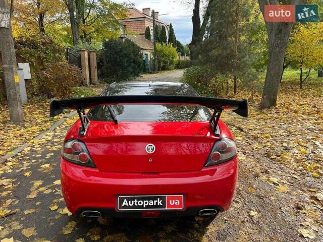 Червоний Хендай Купе, об'ємом двигуна 2 л та пробігом 209 тис. км за 6490 $, фото 5 на Automoto.ua