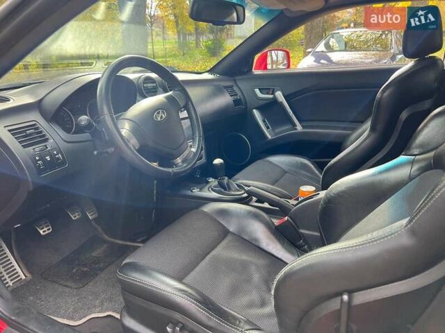 Червоний Хендай Купе, об'ємом двигуна 2 л та пробігом 209 тис. км за 6490 $, фото 9 на Automoto.ua