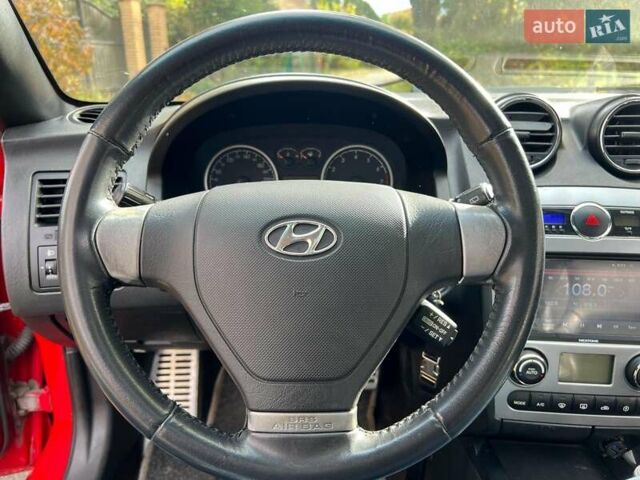 Червоний Хендай Купе, об'ємом двигуна 2 л та пробігом 209 тис. км за 6490 $, фото 10 на Automoto.ua