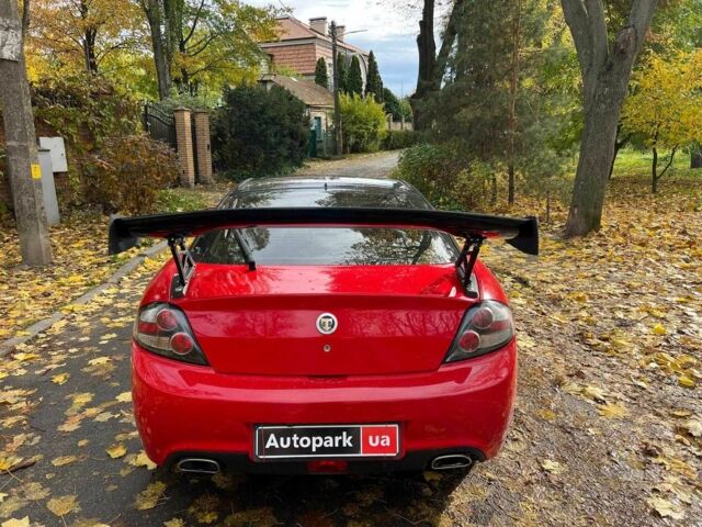 Хендай Купе 2008 в Киеве на Automoto.ua Красный Хендай Купе, объемом двигателя 2 л и пробегом 209 тыс. км за 6490 $, фото 5 на Automoto.ua