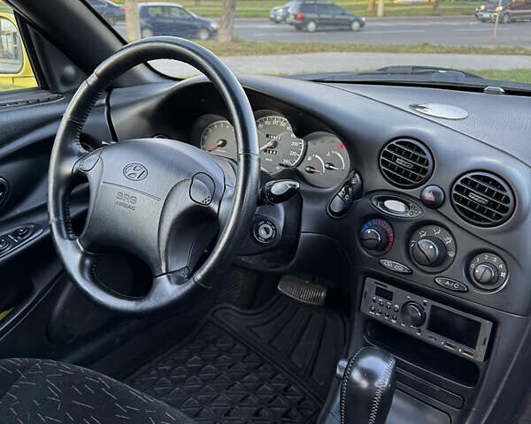 Желтый Хендай Купе, объемом двигателя 2 л и пробегом 206 тыс. км за 4400 $, фото 19 на Automoto.ua