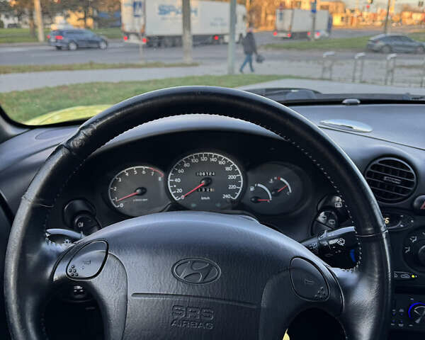 Желтый Хендай Купе, объемом двигателя 2 л и пробегом 206 тыс. км за 4400 $, фото 13 на Automoto.ua