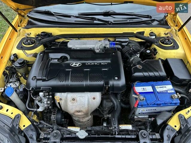Желтый Хендай Купе, объемом двигателя 1.98 л и пробегом 222 тыс. км за 4800 $, фото 23 на Automoto.ua
