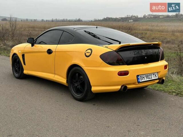 Желтый Хендай Купе, объемом двигателя 1.98 л и пробегом 222 тыс. км за 4800 $, фото 10 на Automoto.ua