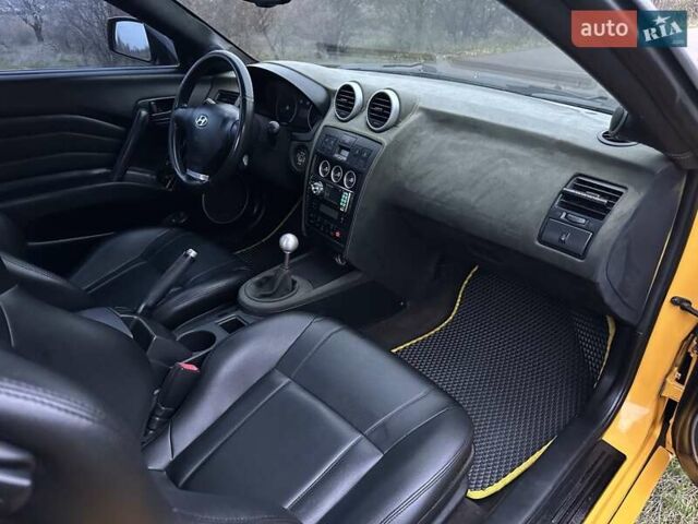 Желтый Хендай Купе, объемом двигателя 1.98 л и пробегом 222 тыс. км за 4800 $, фото 38 на Automoto.ua