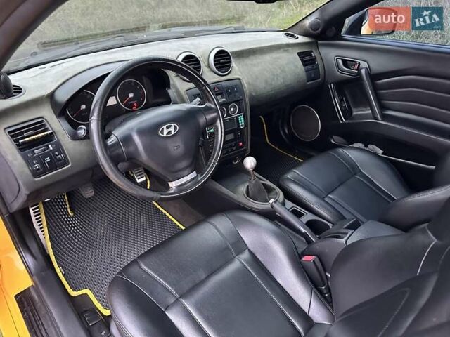 Желтый Хендай Купе, объемом двигателя 1.98 л и пробегом 222 тыс. км за 4800 $, фото 25 на Automoto.ua