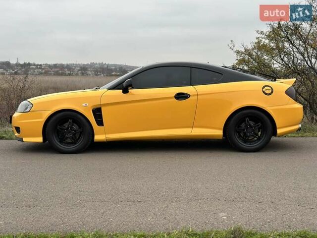 Желтый Хендай Купе, объемом двигателя 1.98 л и пробегом 222 тыс. км за 4800 $, фото 9 на Automoto.ua