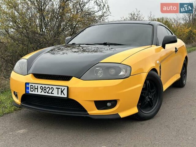 Желтый Хендай Купе, объемом двигателя 1.98 л и пробегом 222 тыс. км за 4800 $, фото 2 на Automoto.ua