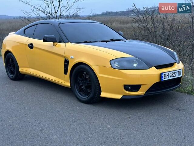 Желтый Хендай Купе, объемом двигателя 1.98 л и пробегом 222 тыс. км за 4800 $, фото 15 на Automoto.ua