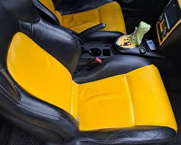 Жовтий Хендай Купе, об'ємом двигуна 1.98 л та пробігом 205 тис. км за 7200 $, фото 9 на Automoto.ua