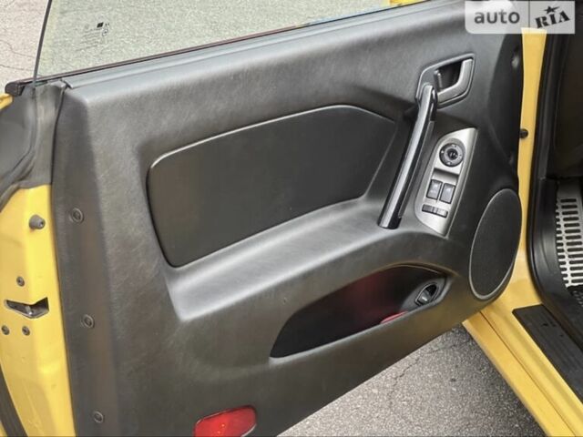 Жовтий Хендай Купе, об'ємом двигуна 2 л та пробігом 198 тис. км за 7199 $, фото 13 на Automoto.ua