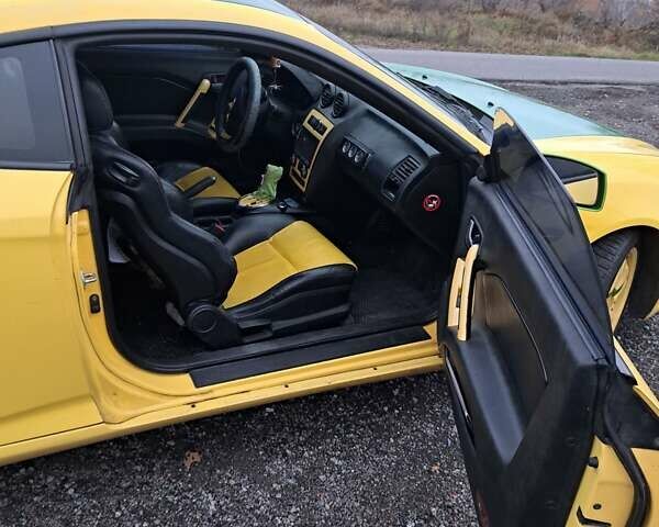 Жовтий Хендай Купе, об'ємом двигуна 1.98 л та пробігом 205 тис. км за 7200 $, фото 5 на Automoto.ua