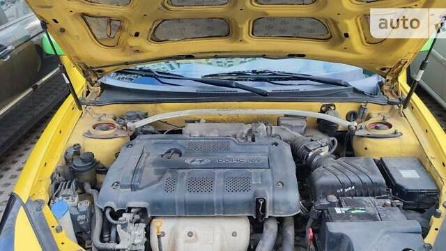 Желтый Хендай Купе, объемом двигателя 2 л и пробегом 189 тыс. км за 5500 $, фото 12 на Automoto.ua