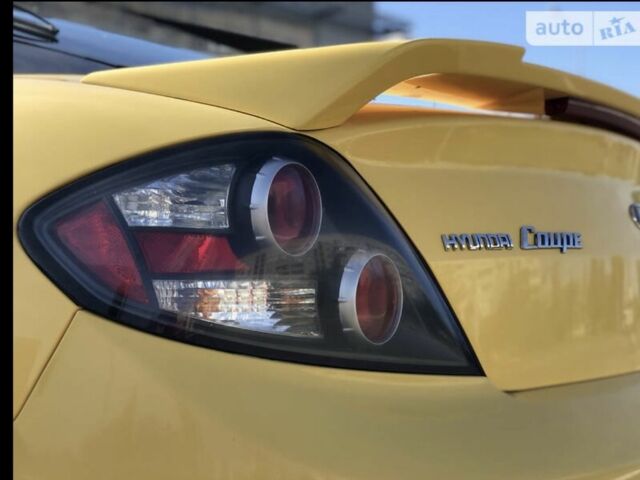 Жовтий Хендай Купе, об'ємом двигуна 2 л та пробігом 198 тис. км за 7199 $, фото 18 на Automoto.ua