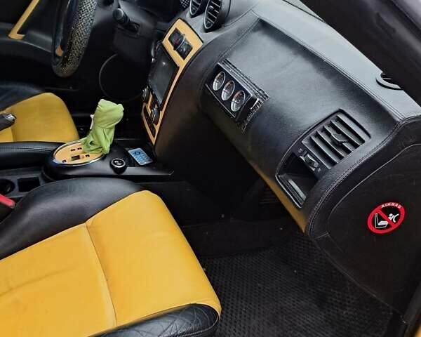 Жовтий Хендай Купе, об'ємом двигуна 1.98 л та пробігом 205 тис. км за 7200 $, фото 3 на Automoto.ua