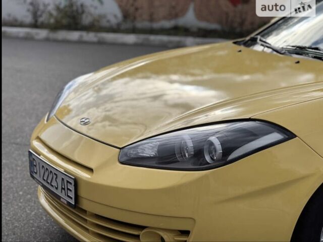 Жовтий Хендай Купе, об'ємом двигуна 2 л та пробігом 198 тис. км за 7199 $, фото 15 на Automoto.ua