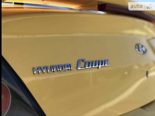 Жовтий Хендай Купе, об'ємом двигуна 2 л та пробігом 198 тис. км за 7199 $, фото 19 на Automoto.ua