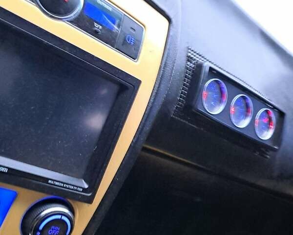 Жовтий Хендай Купе, об'ємом двигуна 1.98 л та пробігом 205 тис. км за 7200 $, фото 4 на Automoto.ua