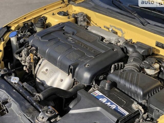 Жовтий Хендай Купе, об'ємом двигуна 2 л та пробігом 198 тис. км за 7199 $, фото 1 на Automoto.ua